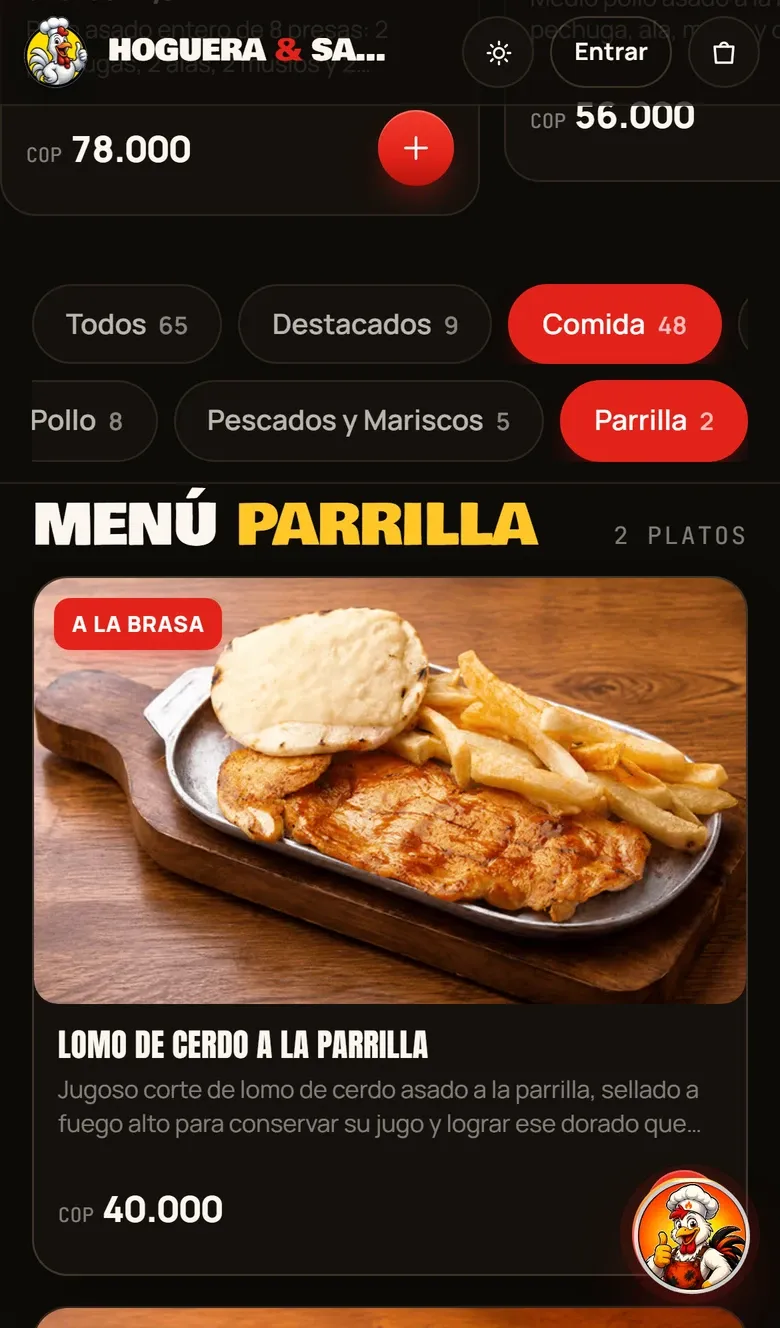 Menú digital de Hoguera y Sabor en producción: su marca, el titular «Tu antojo al carbón, en minutos», la foto del pollo asado entero a 48.000 pesos y los botones de ver el menú y pedir domicilio.